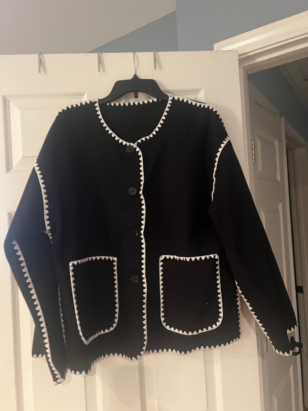 Amazon Black Button Jacket with White Zigzag Trim